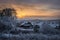 Evening winter sunset over suburban houses on horizont. Winter