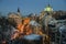 Evening winter view of Andriyivskyy Uzviz Descent with Saint Andrew`s Church in the background. Kyiv, Ukraine