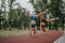 Evening Workout: Sisters in Nature Performing Impressive Flips and Cartwheels