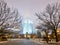 Evenng winter illuminated campus of famous Russian university with snowed evergreen trees in Moscow