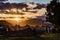 Event center on a Barley field with a backdrop of the Southern Alps at sunset in Wanaka Otago New Zealand