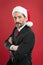 Event planner specializing. Christmas party concept. Man with beard formal suit Santa hat. Businessman celebrate