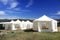 Events or wedding tents in the country field.