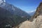 Everest trek, Tourist hiking on Pangboche - Portse upper trail with view of Deboche and Tengboche villages. Mountains Himalayas