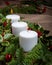 Evergreen Christmas centerpiece with white candles