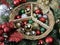 Evergreen Christmas wreath, wicker peace basket, sparkly Christmas balls