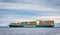 Evergreen container ship with full of cargo docked in port at Vancouver Island Nanaimo
