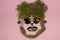 evergreen head creatively lined with sunglasses, mustache and lush hair, creative people art concept