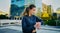 Every second counts towards your health. a young woman looking at her watch while exercising in the city.