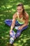 Everyday is a good day to workout. a young woman stretching her legs before a workout.