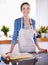 Everyday should be a baking day. A portrait of a happy young woman baking in her kitchen.