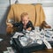 Everything looks great. Boy child with money case. Little boy count money in cash. Small child do business accounting in