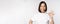 Everything okay. Smiling young asian woman assuring, showing ok sign with satisfied face, standing over white background