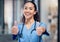 Everythings going to be just fine. a young female doctor showing a thumbs up at a hospital.