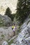 Evia Island, Greece. April 2020:  Tourists climb the mountains on a Hiking trail in the forest in the Dirfis mountains on the Gree