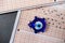 Evil eye bead and optical exam paper, exam and luck