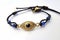 evil eye charm on bracelet, bringing protection and luck