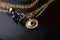 evil eye charm, dangling from delicate gold chain