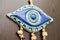 Evil Eye Talisman On The Wall Of A House