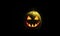 Evil Halloween pumpkin head on a dark background
