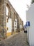 Evora, Portugal, October 2010: Houses built in the arches of Aqueduto da agua de Prata in Evora, Portugal