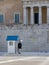 Evzone guard in front of the Greek Parliament and tomb of the Unknown soldier