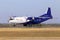 EW-484TI Ruby Star Airways Antonov An-12BP four-engined turboprop aircraft landing on the runway of Borispol International Airport