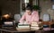 Exam preparation. Student girl in glasses and a pink sweater leaned over books, engaged in an old library at the table.