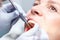 Examination oral cavity or treatment teeth, visiting dental office, blurred background