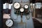 Example of chemical plant retro style equipment three pressure gauges or manometers shows zero closeup with out of focus abstract