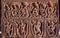 Example of Indian art carvings with life of ancient people and gods at 7th century temples in Pattadakal, India.