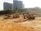 Excavation and ground leveling work using excavator machine and other heavy construction machinery