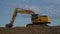 Excavator on blue sky time lapse construction site yellow heavy equipment shovel