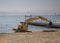 Excavator in Cannes town. France