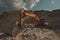 excavator in a cave quarry