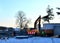 excavator on a construction site in the winter. Danger zone, no entry allowed