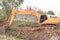 Excavator crawler in site build the pond