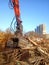 Excavator and destroyed building, earthquake, pile of rubble and debris, landfill