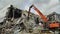 Excavator destroys detail at demolition site of stadium