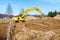 Excavator dig the trenches at a construction site. Trench for laying external sewer pipes. Sewage drainage system for a multi-