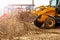 Excavator. Digger machine digging earth in construction site