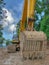 An excavator dozer working on road construction site