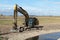 Excavator at Havel river. renaturing of the river in germany