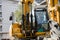 Excavator, hydraulics, tires, screws