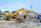 Excavator at Industrial landfill for the processing of old, old concrete structures.