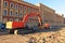 Excavator with a large bucket on a crawler track