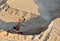 Excavator with large bucket in working in a opencast quarry