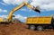 Excavator loading dumper truck