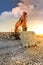 Excavator in a mining factory where stone is extracted