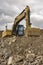 An excavator moves stone and rock in a quarry